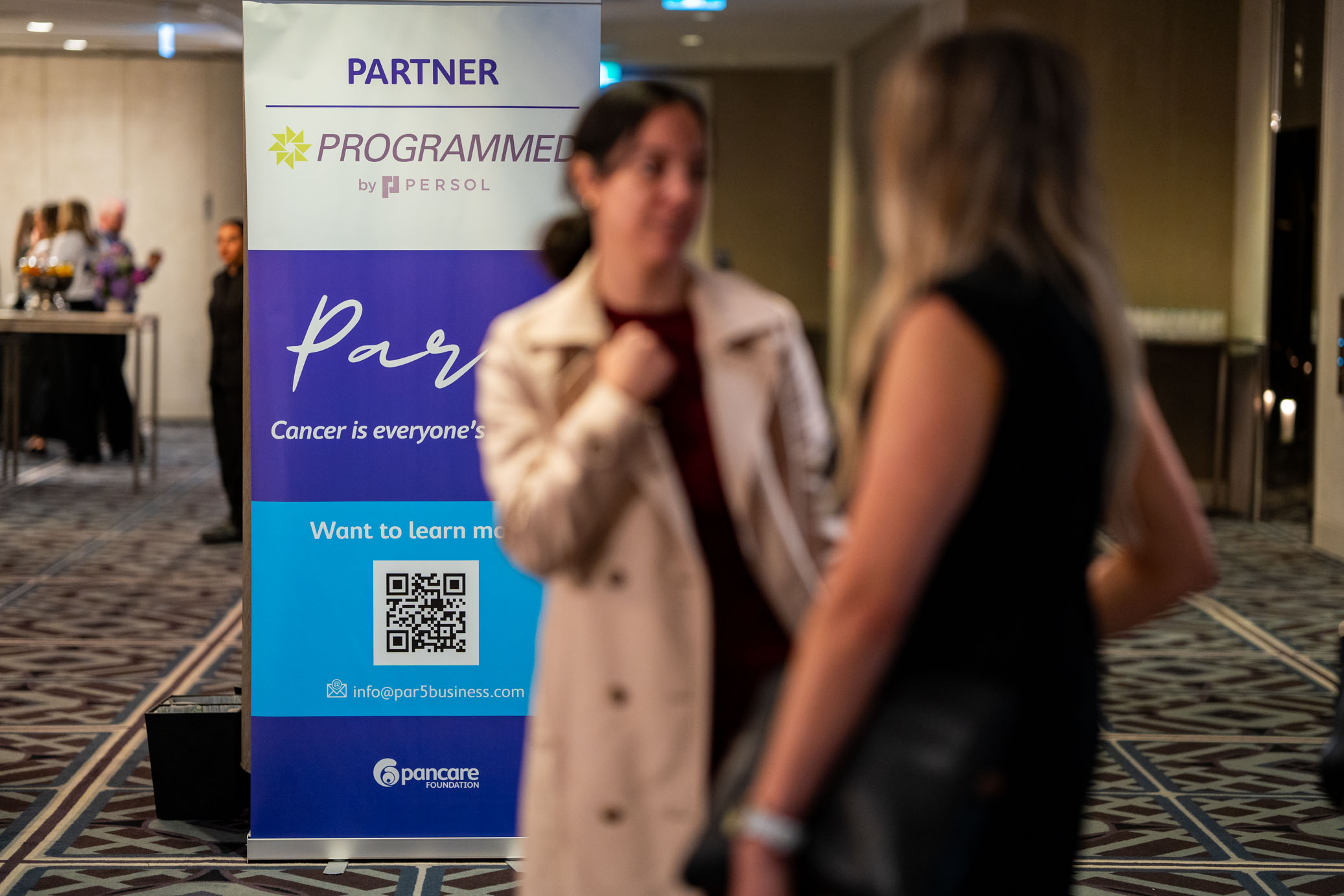 Partners at a Par 5 event